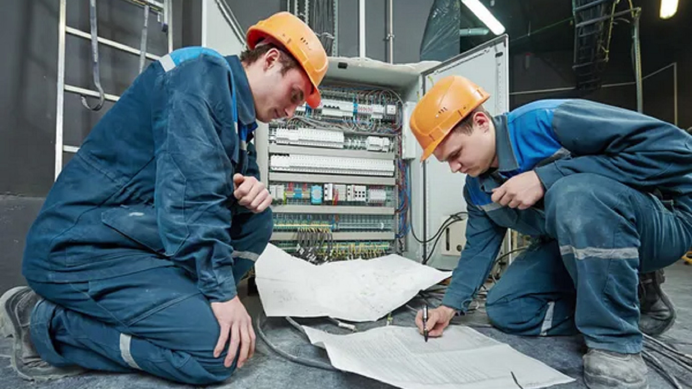 Home depositphotos 42220331 stock photo two electrician workers